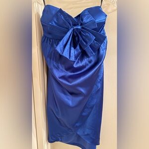 Elegant Blue Strapless Dress with a Bow.
A Great Homecoming dress!